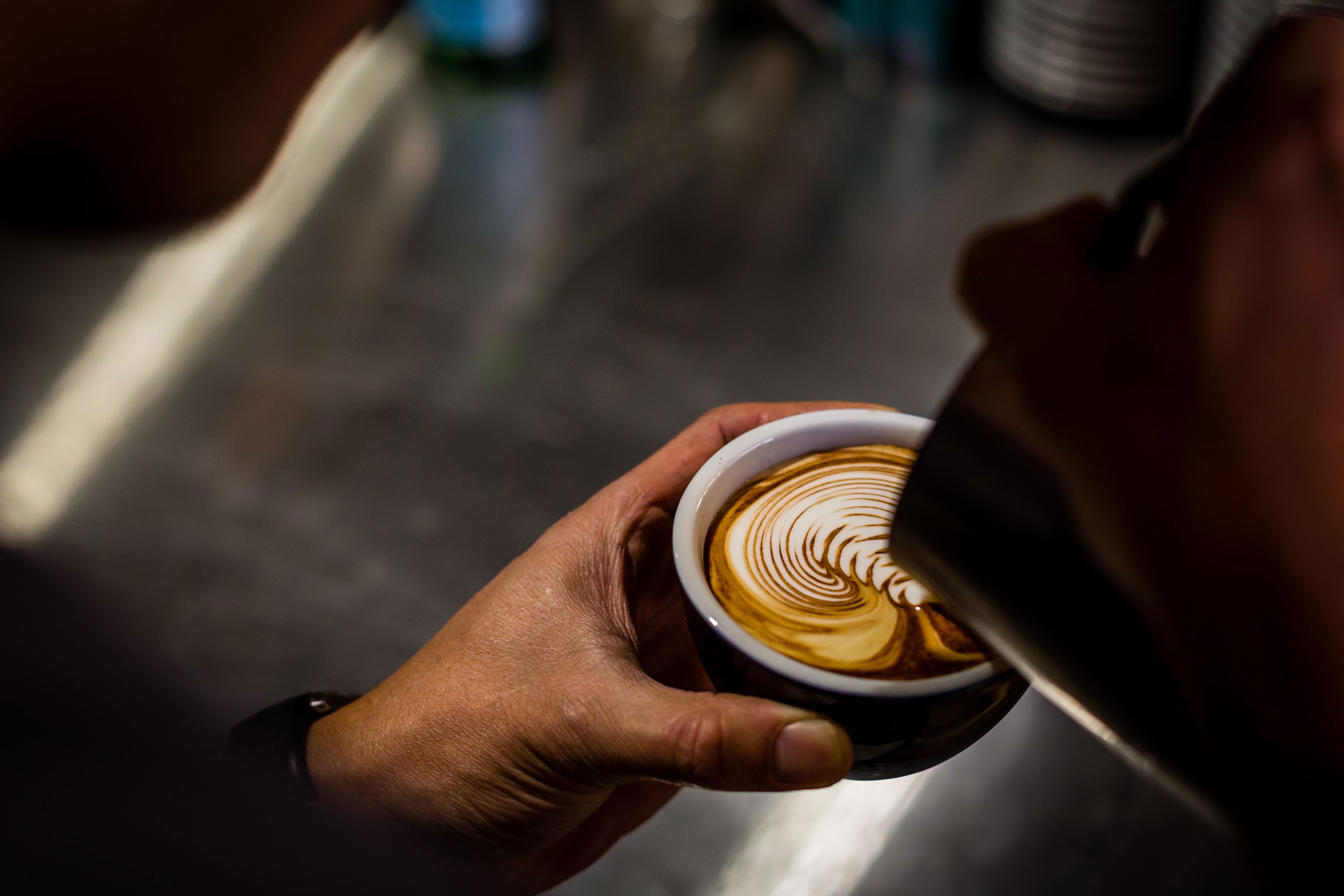 Closeup Of The Man Pouring Coffee Into The Cup 2023 11 27 05 30 11 Utc