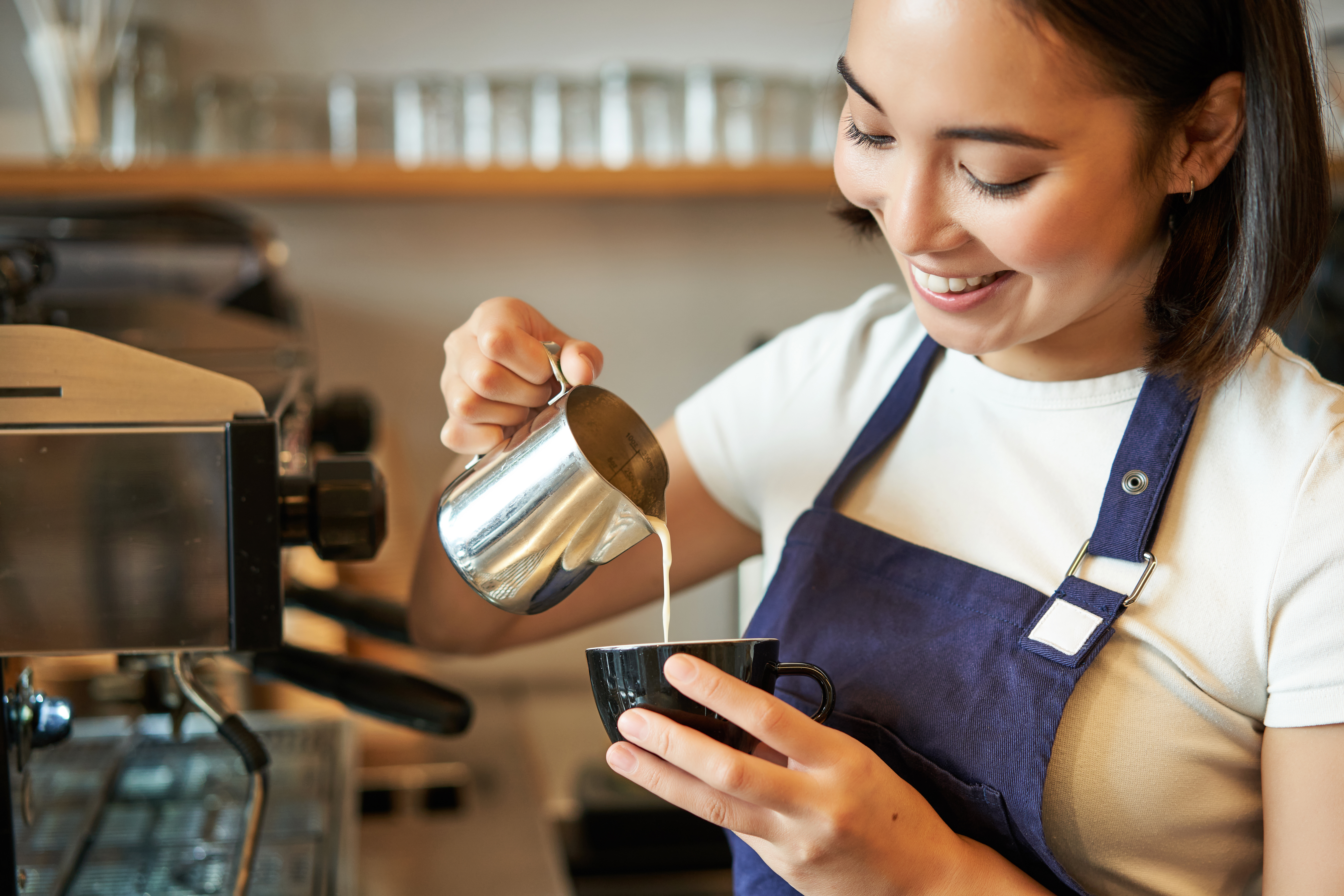 Smiling Asian Barista Girl Making Coffee